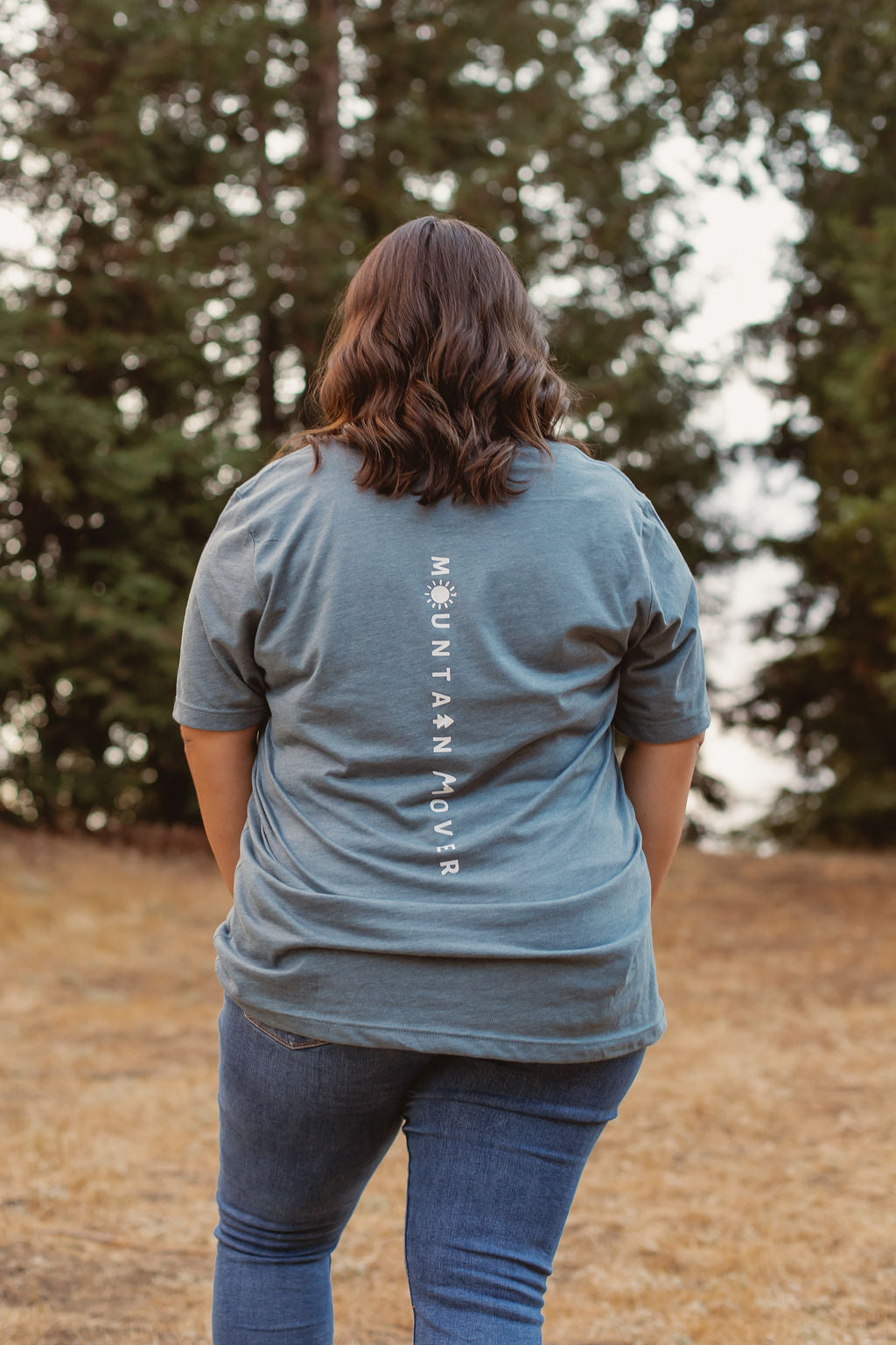 Blue t-shirt with white mountain mover text