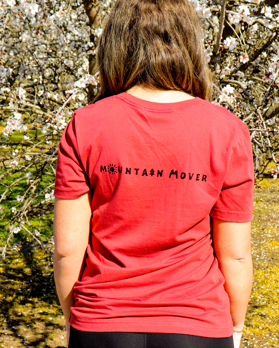 Mountain Mover black stamp on orange t-shirt