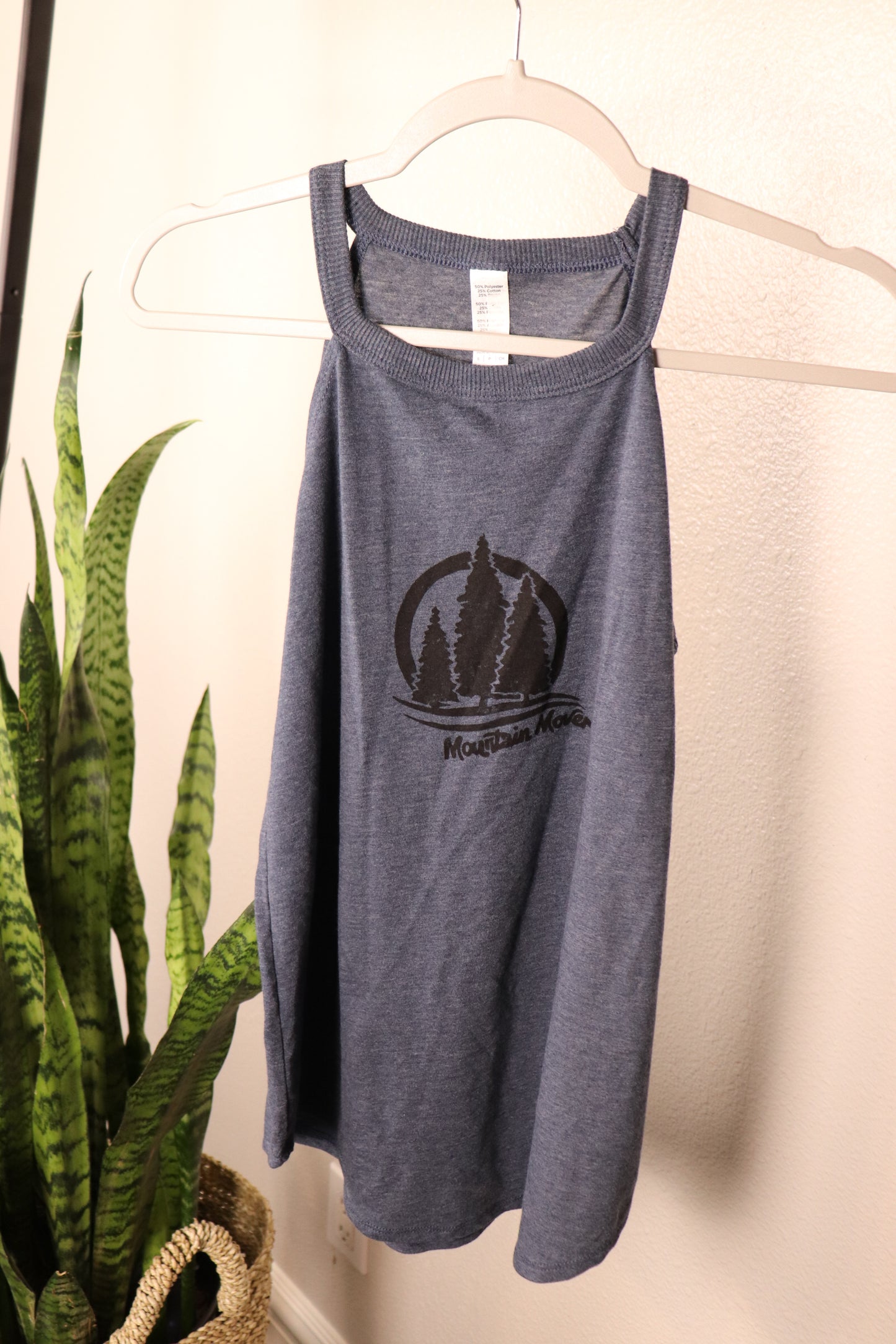 navy blue tank with black three tree stamp and mountain mover written beneath