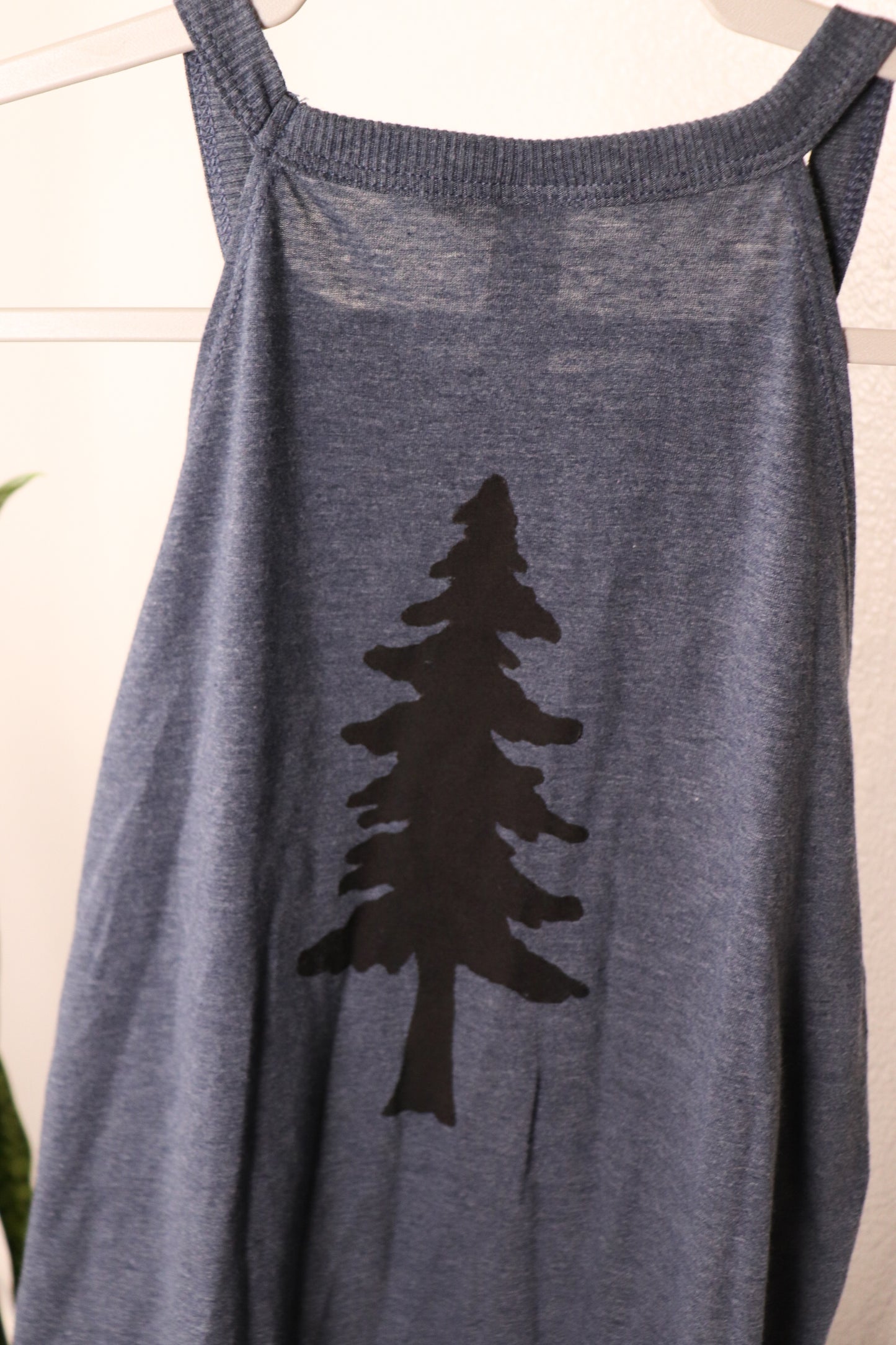 navy blue tank top with black tree stamp