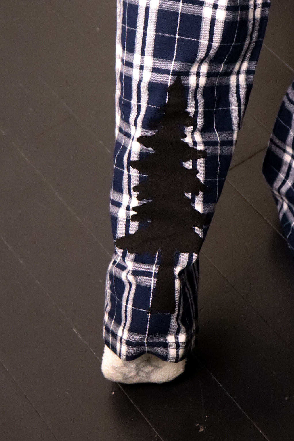 Bottom of flannel Pajama pants with tree stanp