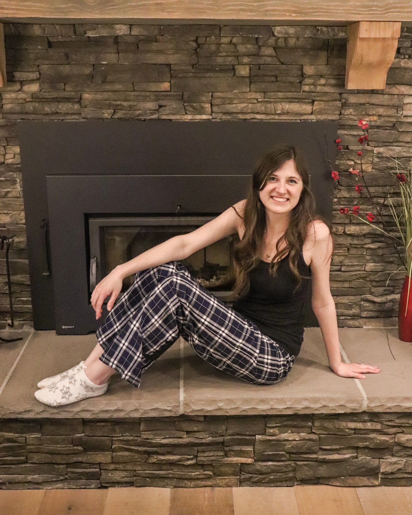 woman wearing blue flannel pajama pants